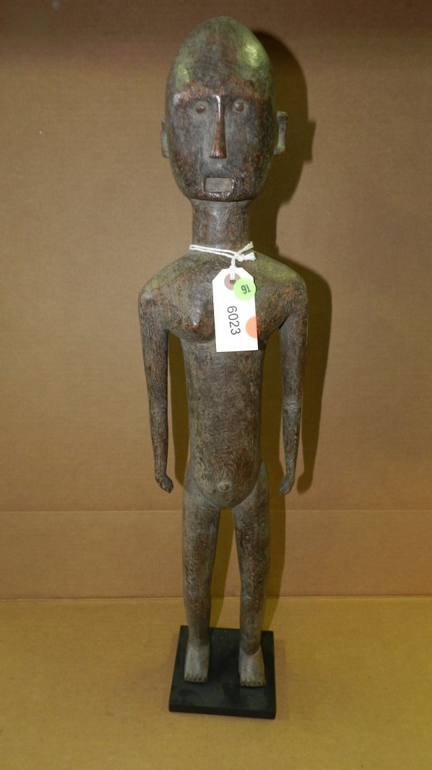 6023) East African female standing figure from: 6023) East African female standing figure from Tanzania. 30"