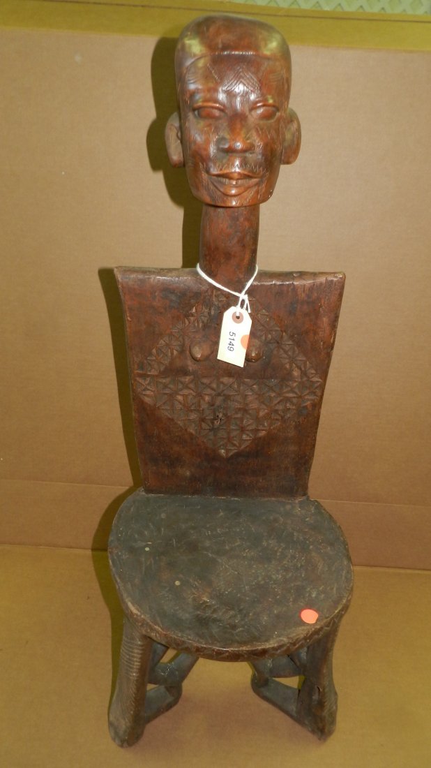 5149) African carved high back chair with head, East: 5149) African carved high back chair with head, East Africa, 34 x 12 Shipping Alert * this item is larger than what our shippers can handle, we can still offer to ship this item to you with our "In-ho