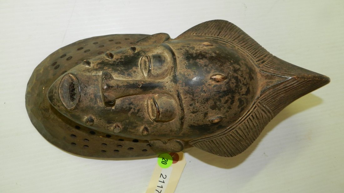2117) African hand carved Baule mask w/ lower part and: 2117) African hand carved Baule mask w/ lower part and right side eroded 13 x 6 x 5 Ivory Coast