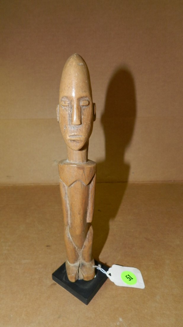 1294) African carved standing asexual figure. 10": 1294) African carved standing asexual figure. 10" w/stand