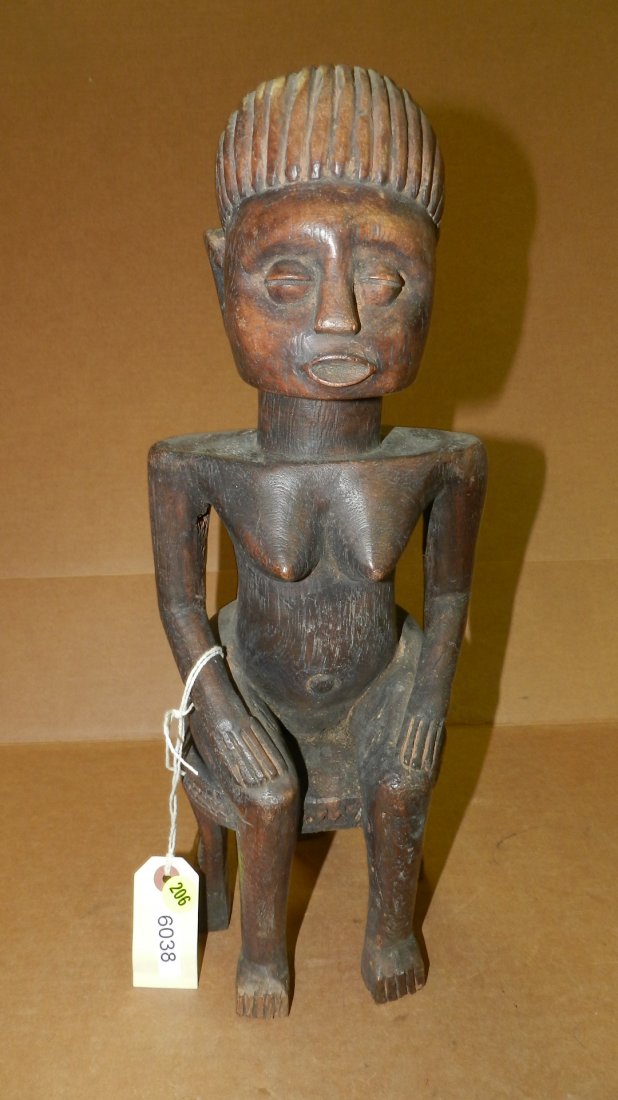 6038) East African female figure sitting on stool: 6038) East African female figure sitting on stool Tanzania, 18"