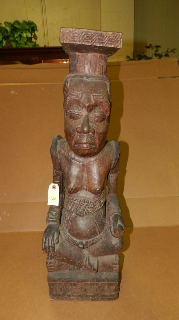 1789) African Kuba Ndop figure. A representation of a: 1789) African Kuba Ndop figure. A representation of a Kuba King sitting cross-legged. Carved in hardwood. DR Congo, 30"