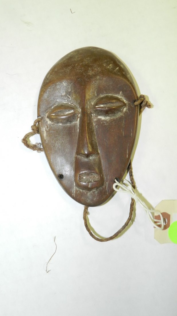 1660) African carved Lega mask, from DR Congo. 5 1/2 x: 1660) African carved Lega mask, from DR Congo. 5 1/2 x 3 1/2