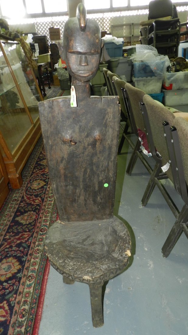 3936) East African carved high backed chair, as found.: 3936) East African carved high backed chair, as found. From Tanzania. SSR = Special shipping required. 47"