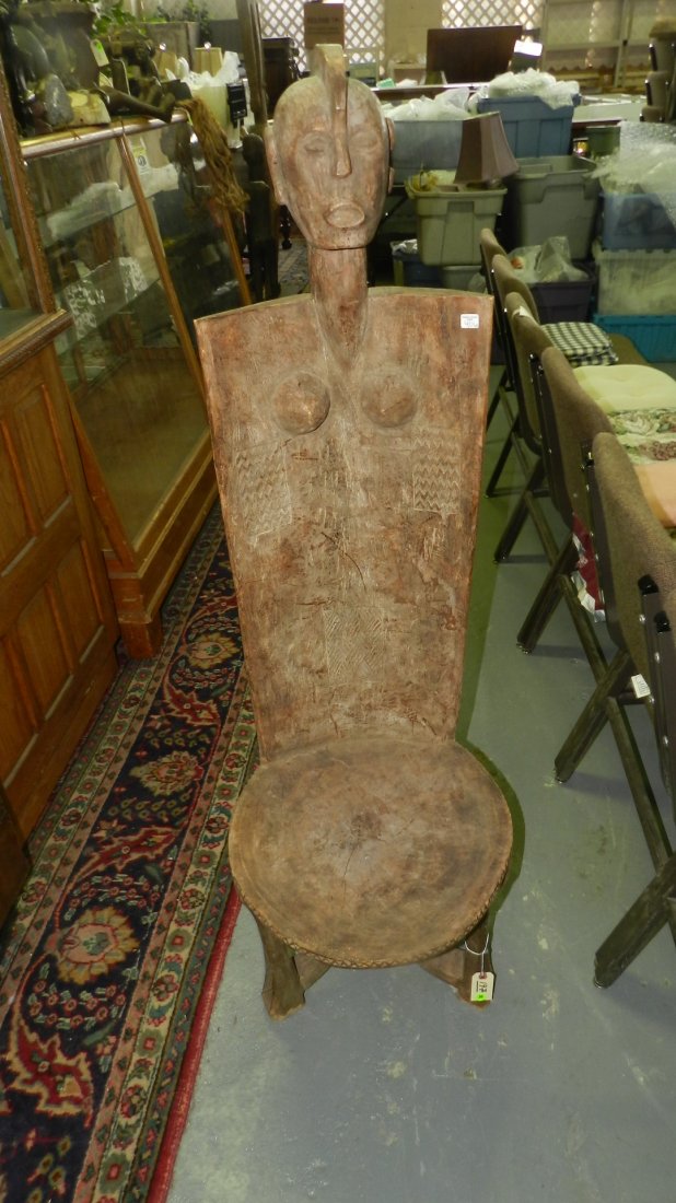 197) East African carved high backed chair, 54" SSR: 197) East African carved high backed chair, possibly Liguru? From Tanzania. 54" SSR