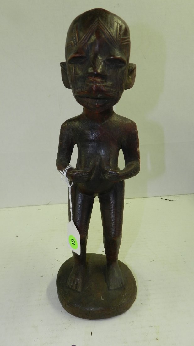 6084) East African carved asexual standing female figur: 6084) East African carved asexual standing female figure. From Tanzania. 15"