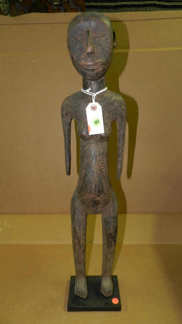 5124) East African carved standing female figure. 31" w: 5124) East African carved standing female figure. 31" w/stand