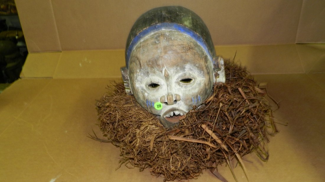 6734) African carved Suku helmet mask. From DR Congo. 1: 6734) African carved Suku helmet mask. From DR Congo. 13 x 15 x 15 w/Raffia