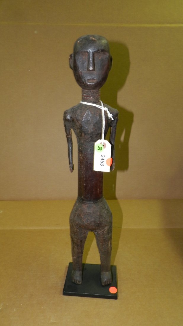 2453) East African carved asexual figure, from Tanzania: 2453) East African carved asexual figure, from Tanzania. 24"