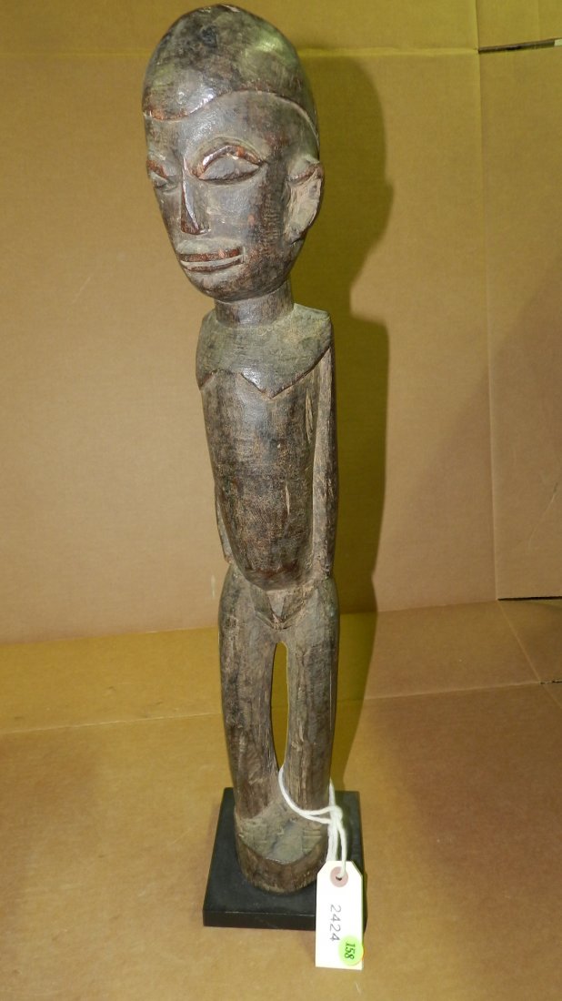 2424) African carved Lobi figure on pedestal, from Burk: 2424) African carved Lobi figure on pedestal, from Burkina Faso. 24"