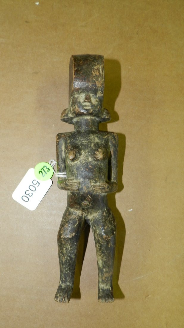 5030) East African carved standing female figure, from: 5030) East African carved standing female figure, from Tanzania. 8 1/2"