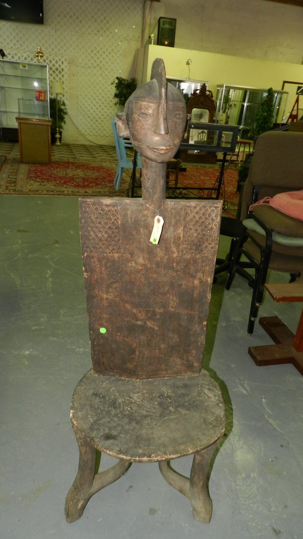 3892) carved East African high-backed chair Nyamwezi Ta: 3892) carved East African high-backed chair Nyamwezi Tanzania SSR 52"