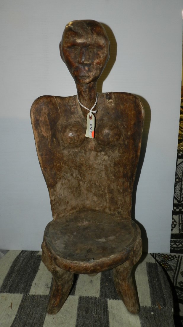 6157) Carved High backed chair - East African, from: 6157) Carved High backed chair - East African, from Tanzania. 33"
