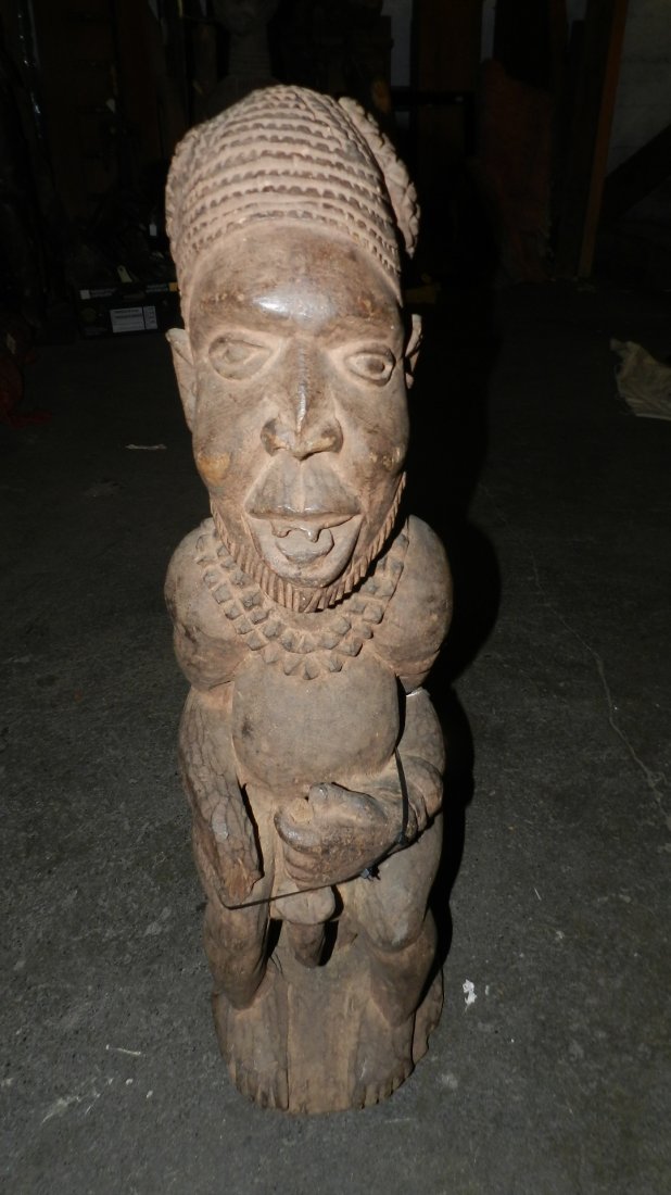 7133) African carved seated figure: 7133) African carved seated figure