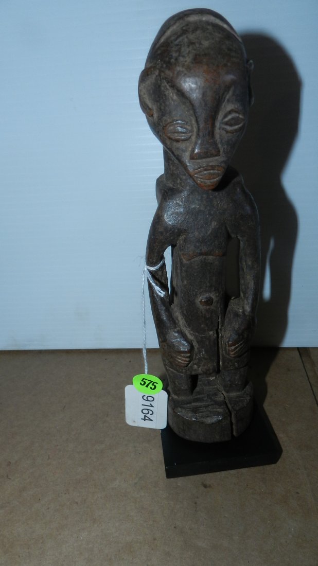 Standing Central African figure with integral base (Pro: Standing Central African figure with integral base (Prominent frontal crack and in back of head and torso). On Stand.