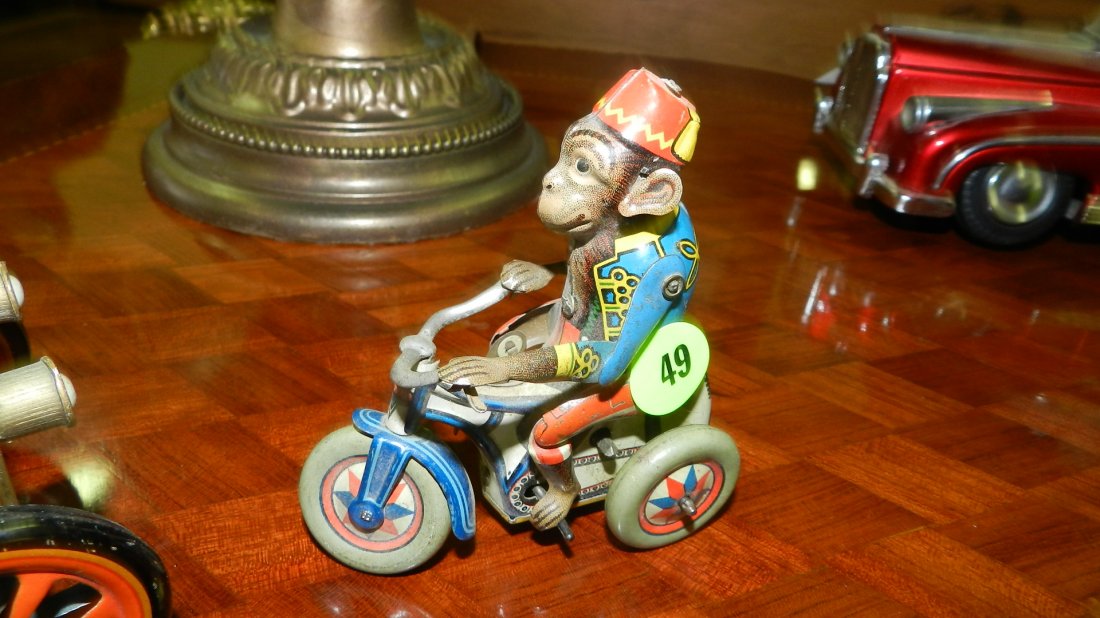 Antique tin litho wind up monkey on trike toy,: Antique tin litho wind up monkey on trike toy, untested, no key