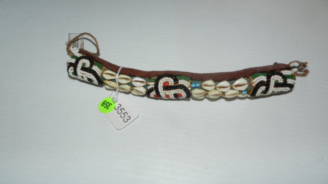 3553) African handmade Cylindrical beaded item: 3553) African handmade Cylindrical beaded item w/cowries 10"