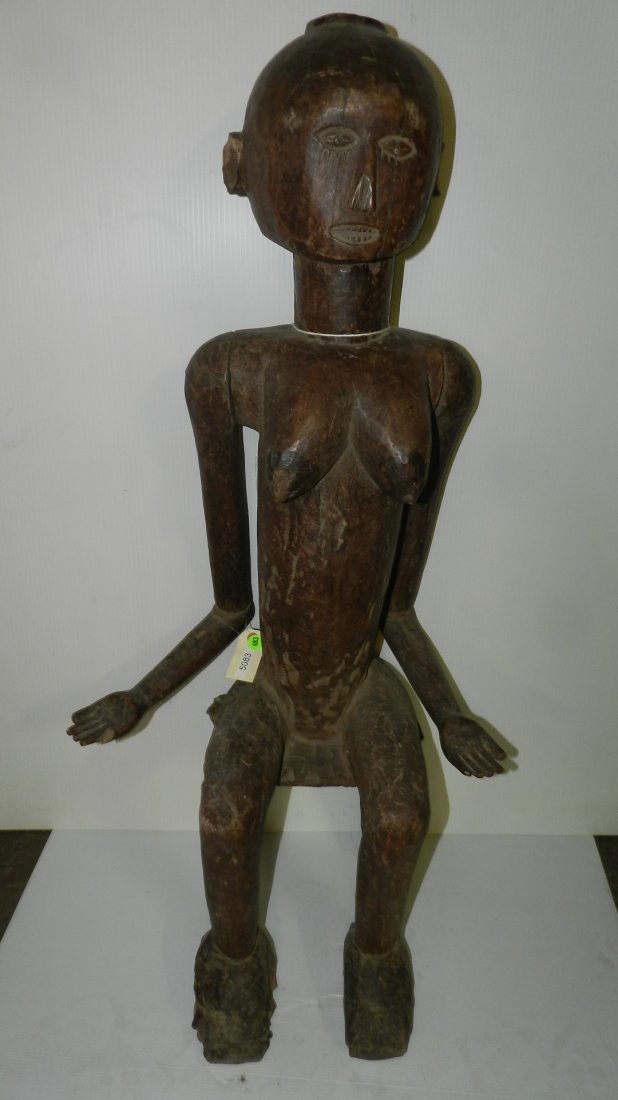 5083) African carved Seated East African female figure: 5083) African carved Seated East African female figure w/articulated arms, Tanzania, 40" SSR