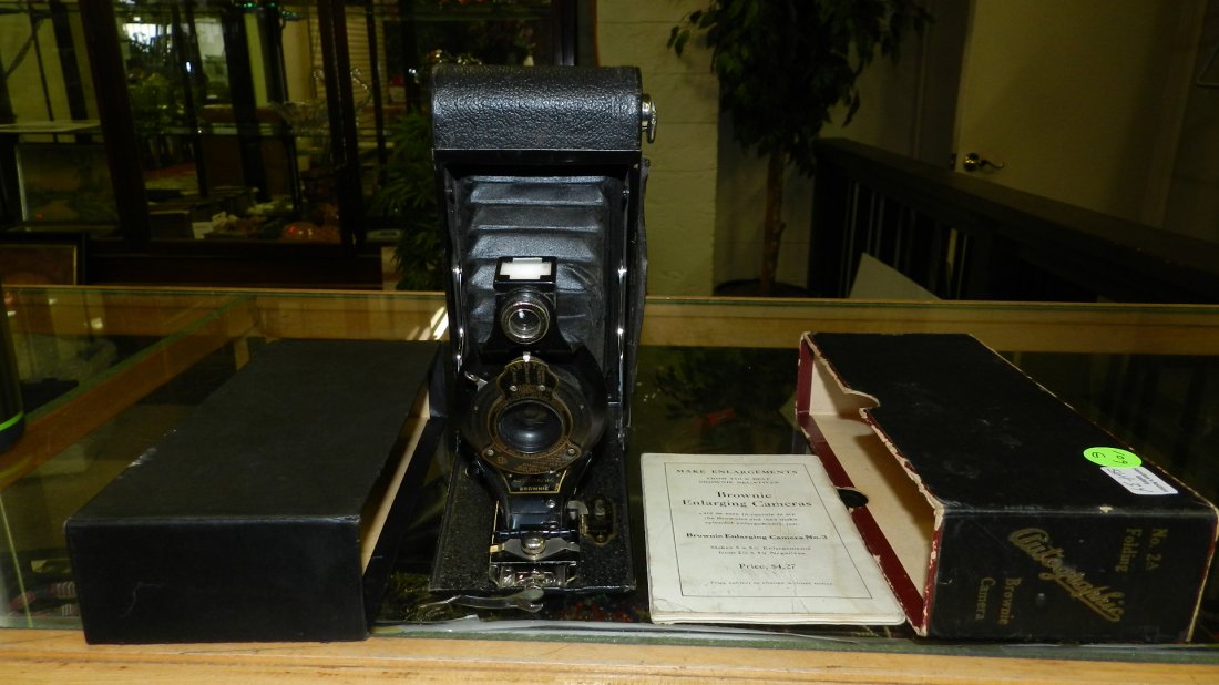 antique folding camera in case with booklet: antique folding camera in case with booklet