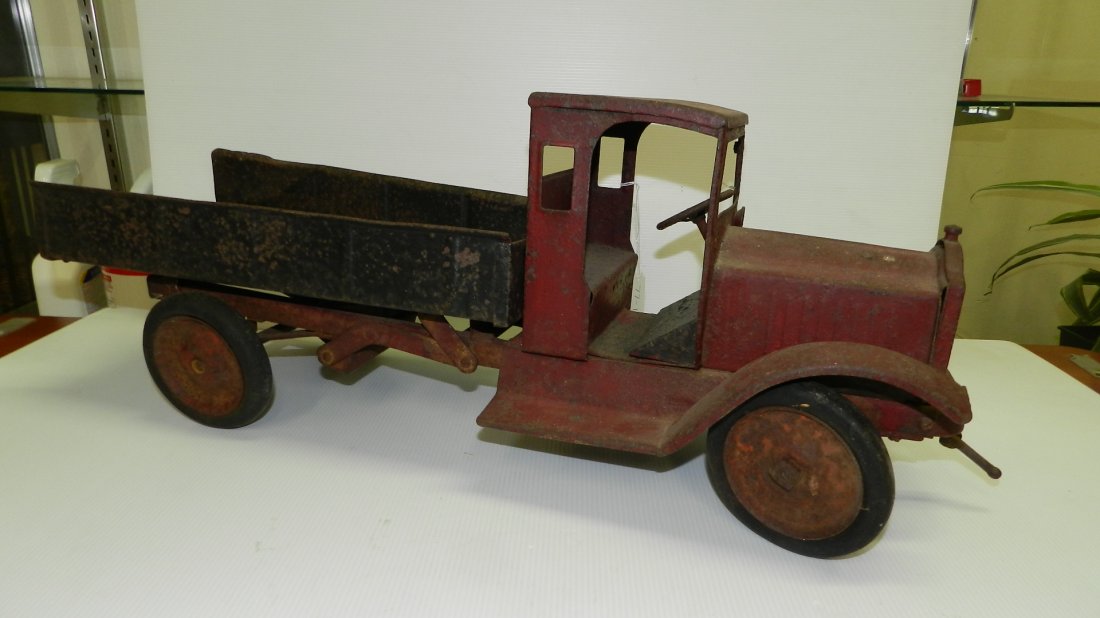 Antique Sturditoys? Buddy L? Construction Truck Pressed: Antique Sturditoys? Buddy L?Construction Truck PressedSteel 1920's Vintage Dumptruck Toy original cond,missing one wheel cap, lightrust, bent corner bed rail,
