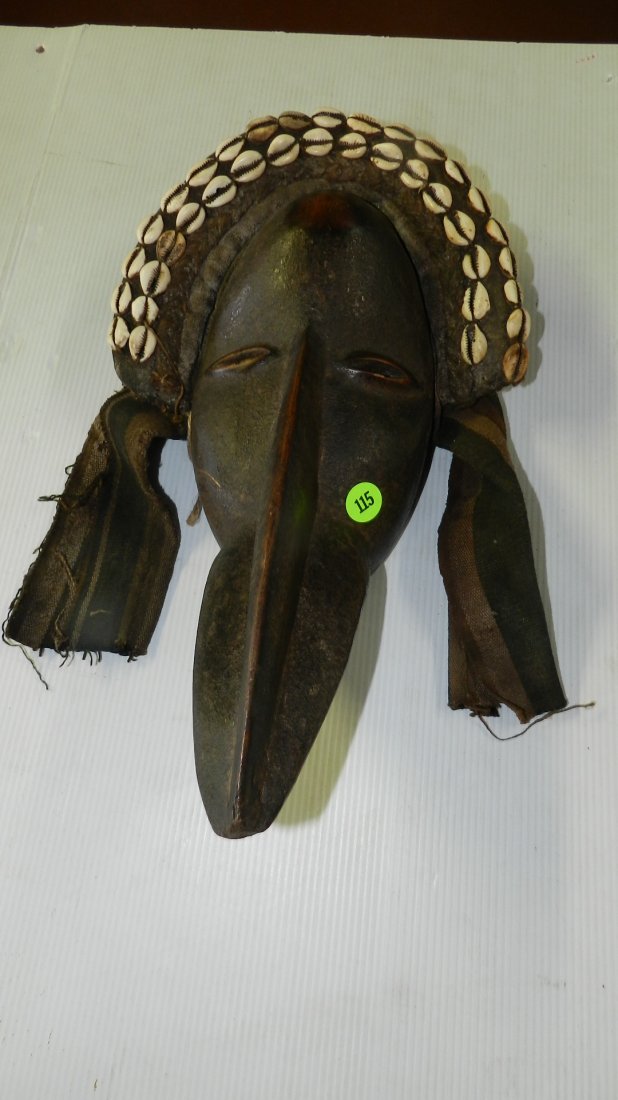 African carved mask with cowrie shells and cloth (1 of 6)
