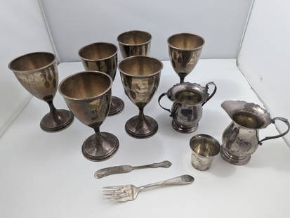 Sterling Silver Goblets plus more: Six sterling silver goblets, one cream and sugar set. a small cup and two pieces of cutlery. 990 grams total weight