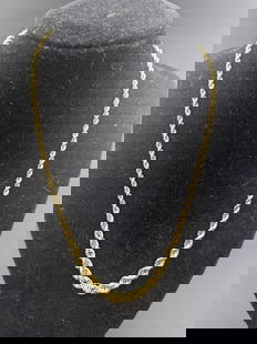 18K Gold Necklace: Graduated rope 17inch necklace marked 18K. Weight 6.6 grams