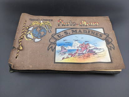WWII U.S. Marines Photo Album: WWII era U.S. Marines photo album. 7x11 loose bound. 17 pages of photographs largely in the Pacific Theater.