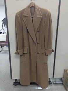 Burberry Camel/Wool Coat: Burberry Camel/Wool CoatArm Length 22 3/4", 46" Length, 35" ChestWear noted on left pocket, small hole on left sleeve, collar, extra button in left pocket