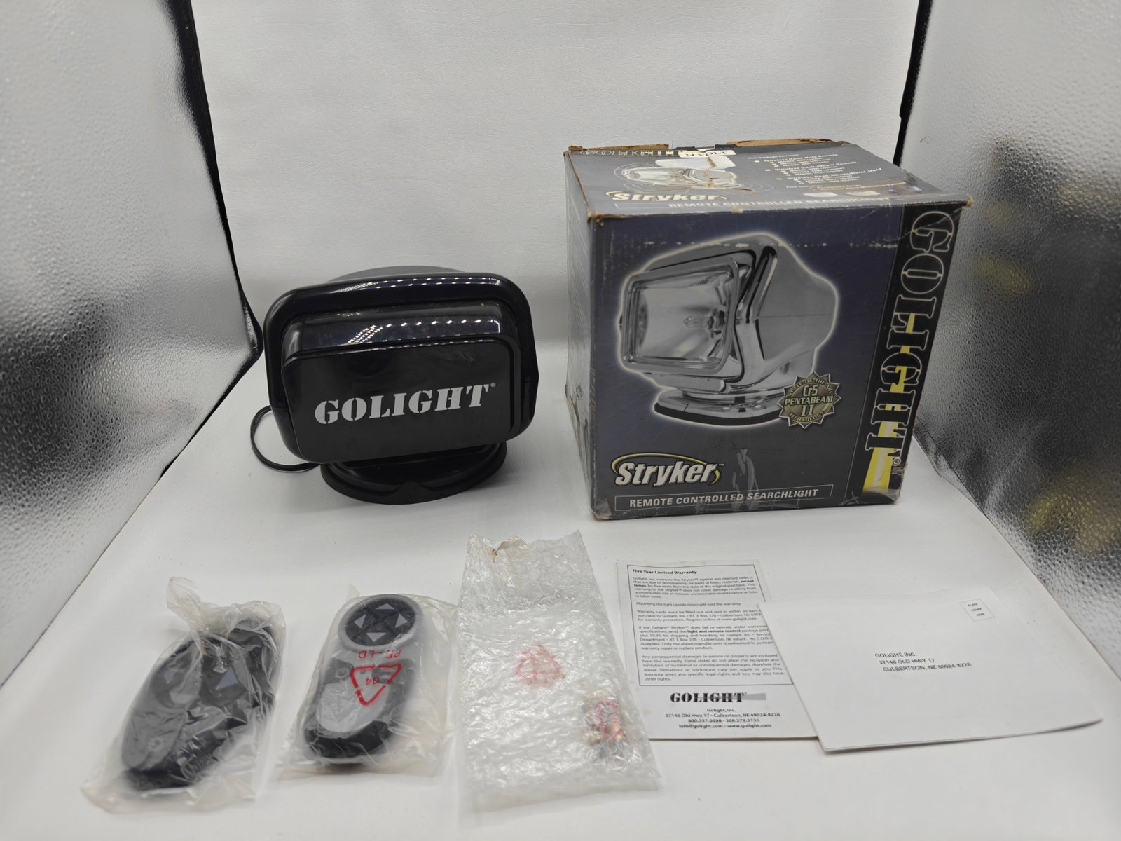 Stryker GOLIGHT Remote Controlled Searchlight: Stryker GOLIGHT Remote Controlled Searchlightincludes box, two remotes, and instruction manual