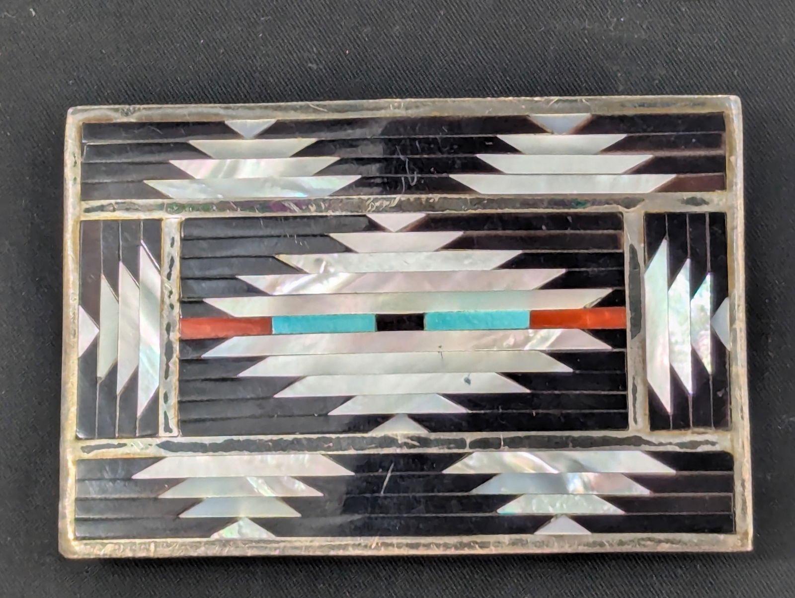 Zuni Native American Belt Buckle by C. Dishta Sterling Silver with Mother of Pearl,turquoise, coral: Zuni Native American belt buckle by C. Dishta Sterling Silver with MOP,turquoise,coral, and jet inlay total weight 51.1 g