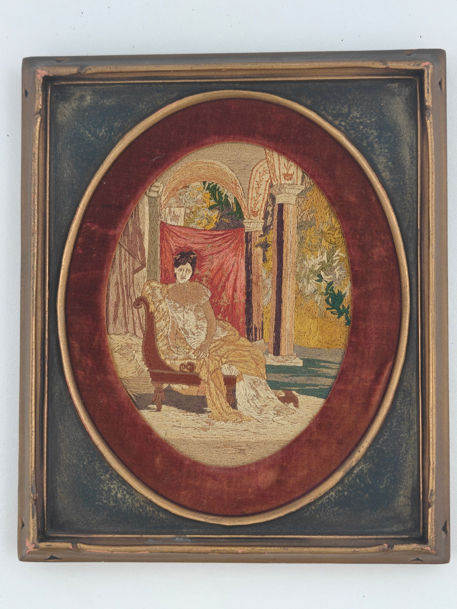 Antique Silkwork Embroidery: A finely detailed antique silkwork embroidery depicting a seated lady in a classical interior, complete with drapery, columns, and floral background. The embroidery retains very good color and detail,