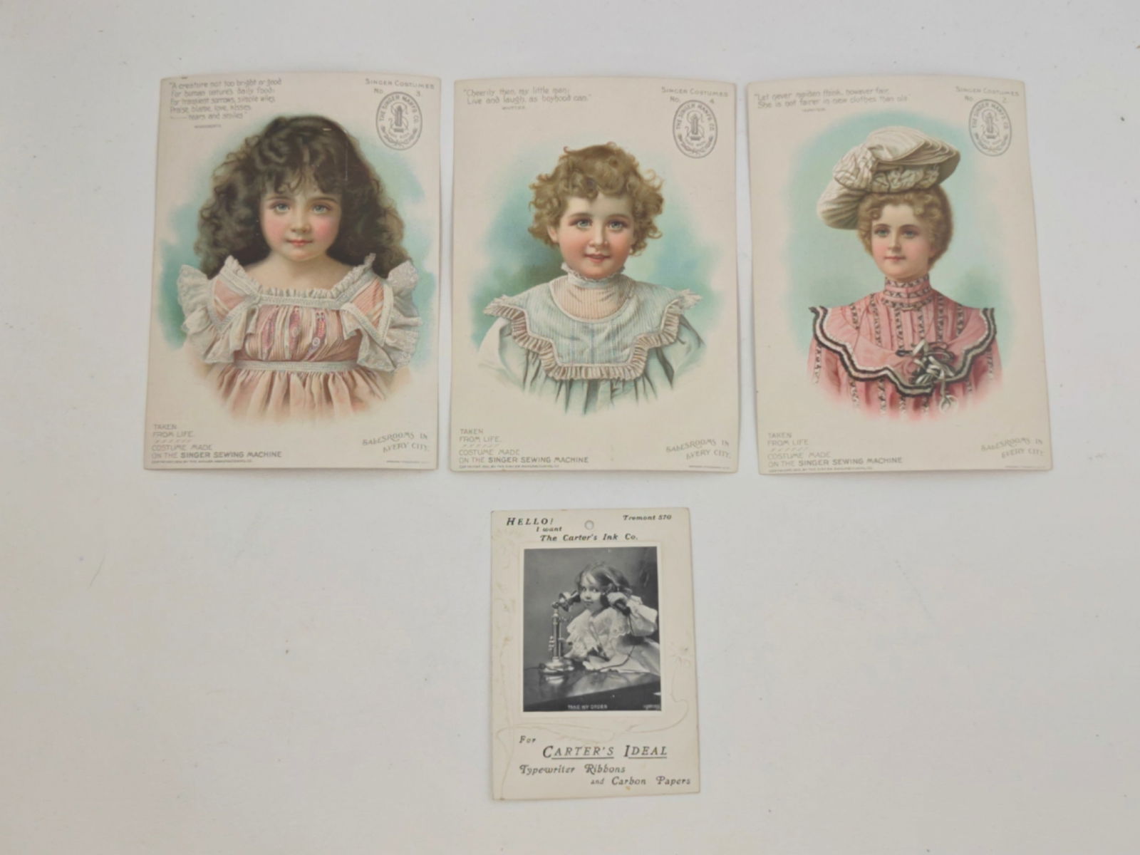 Vintage Singer Sewing Machine Advertising Cards and Carter’s Ink Co. Card (4): Group of four antique advertising trade cards including three chromolithograph Singer Sewing Machine “Singer Costumes” cards and one Carter’s Ink Co. card. The Singer cards feature finely