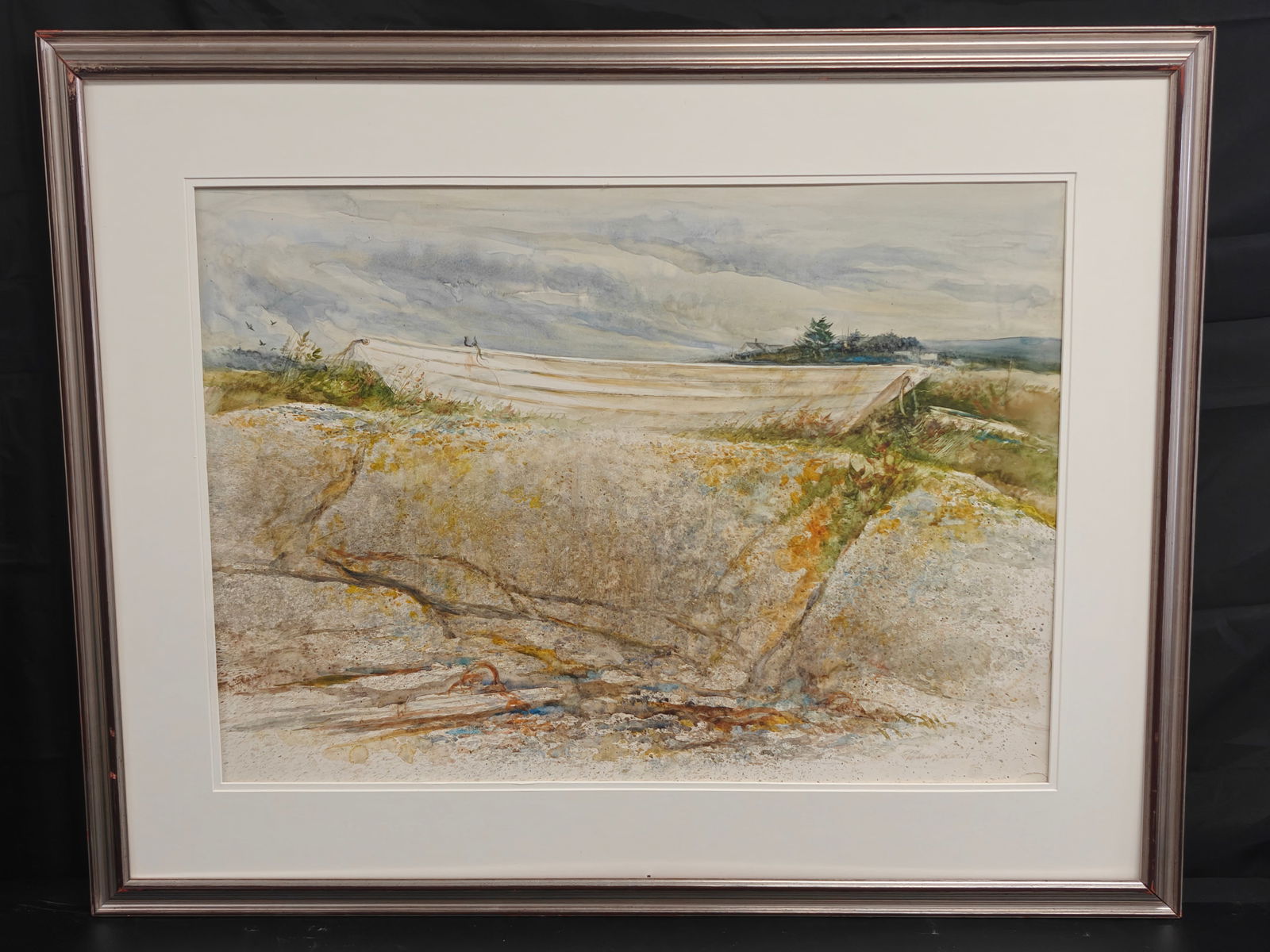 Murray Jackson Wentworth (1927–2008), Coastal Landscape with Fishing Nets, Watercolor on Paper: A finely executed coastal watercolor by American artist Murray Jackson Wentworth depicting fishing nets stretched across weathered rock along a windswept shoreline. The composition is layered with del