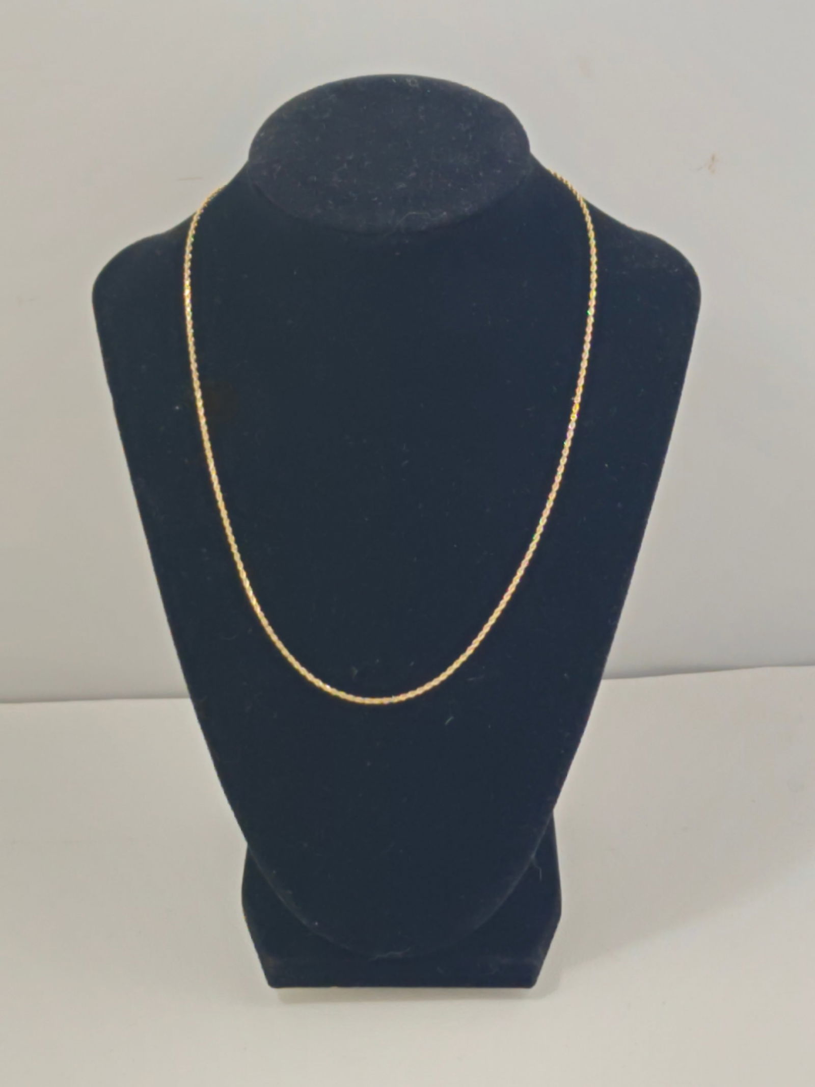 14K Gold Rope Chain Necklace, 4.13g: 14K yellow gold rope chain necklace. 17" long. Classic twisted rope link design with spring ring clasp. Marked 14K on clasp. Lightweight and wearable chain suitable for everyday use or layering. Total