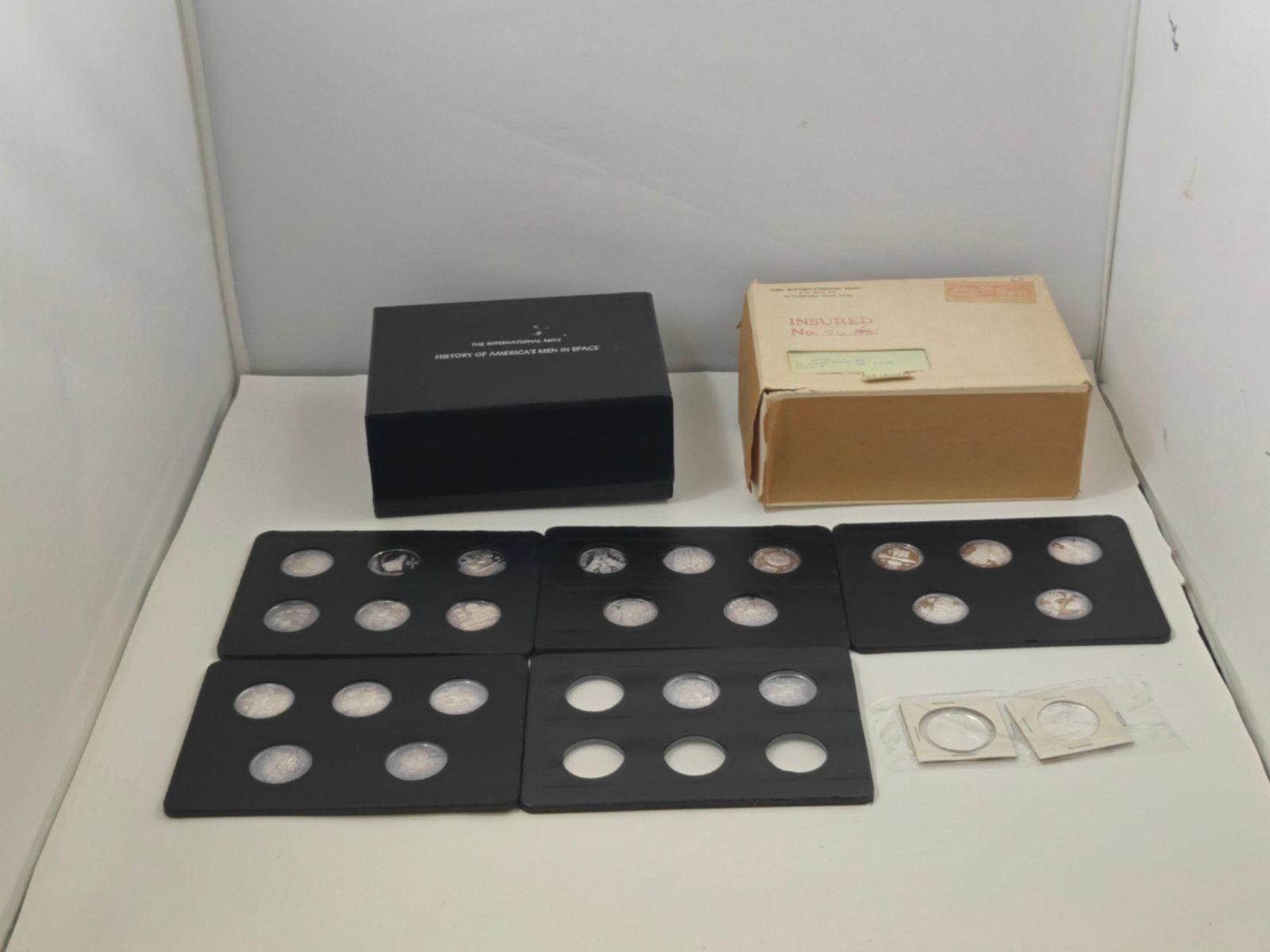 International Mint History of America’s Men in Space .999 Silver Medal Set (24 Coins): Complete set of "History of America’s Men in Space" silver proof medals issued by The International Mint. Includes 24 .999 fine silver medals housed in original display holders with original box and