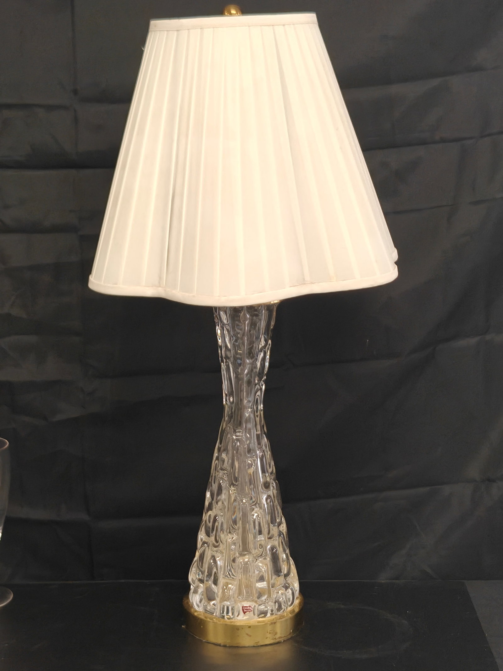 Carl Fagerlund for Orrefors Crystal Table Lamp: Mid-century modern table lamp designed by Carl Fagerlund for Orrefors, Sweden, featuring a sculptural textured crystal body with gilt-tone metal base and fittings. Retains the original Orrefors Sweden