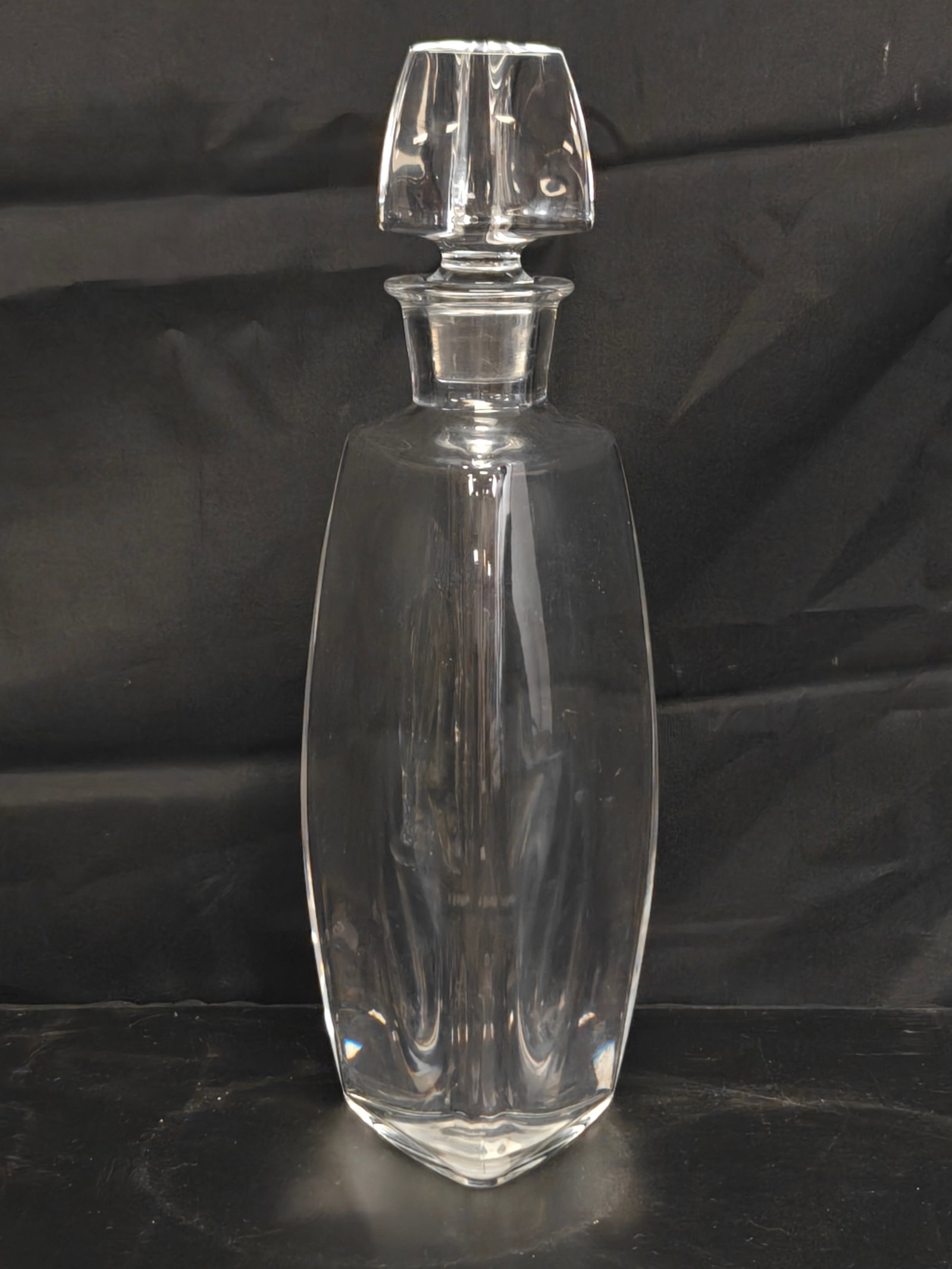Baccarat France Vosges Crystal Decanter: Baccarat France crystal decanter in the Vosges pattern, featuring a faceted rectangular-form body with rounded edges, matching geometric stopper, and substantial weighted base. Bears the Baccarat Fran