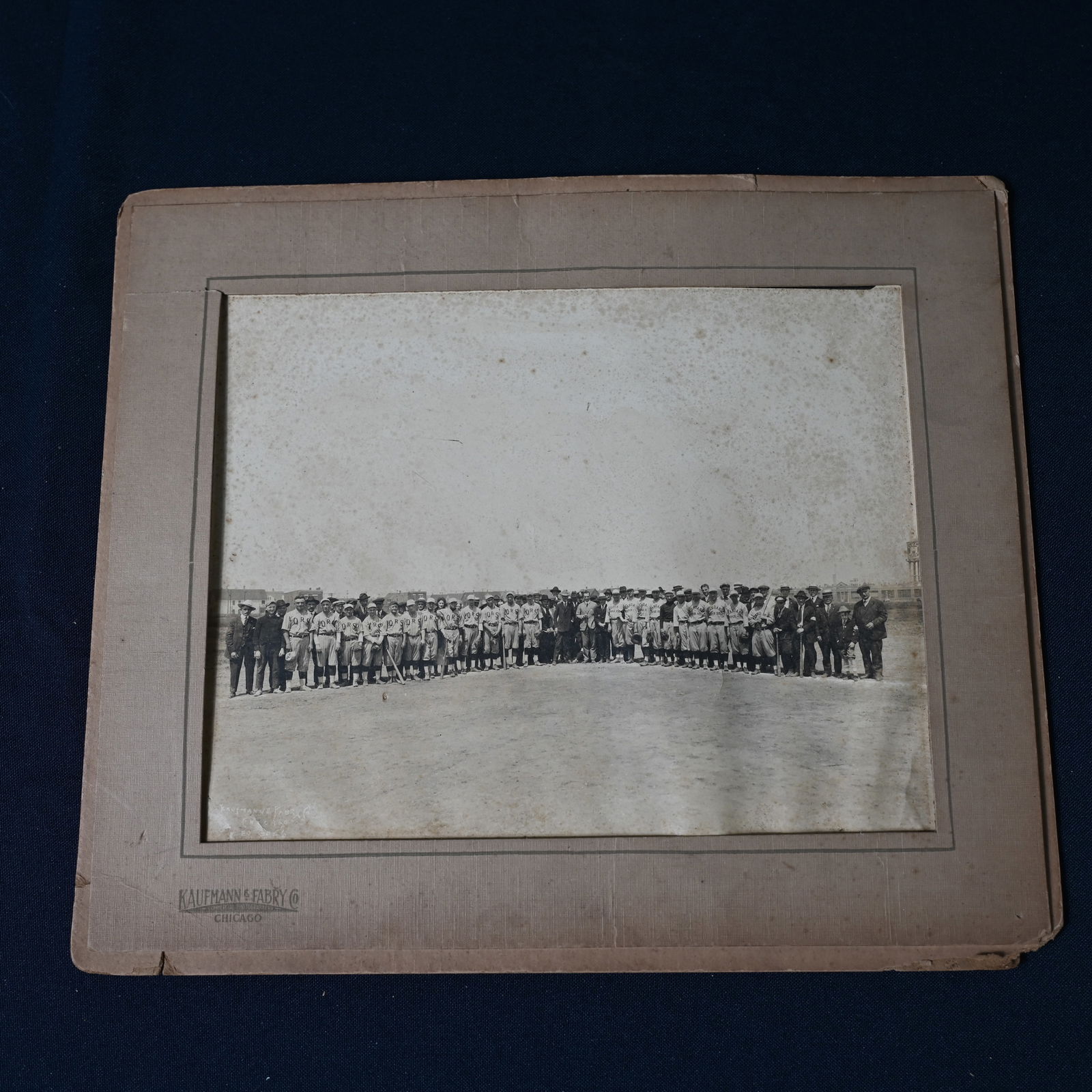 Baseball Teams Photograph QRS vs Standard: May be a photo of a photo. Water tower, on the upper right, most matted out, has a sign - logo for Field Bags ( we at least believe the second word is Bags ). Kaufman Fabry Co Chicago ( also in the