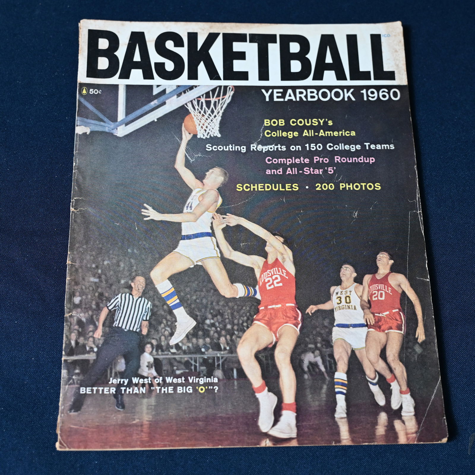Basketball Yearbook 1960: Ned L Pines, Publisher, Copyright 1959 by Popular Library, Inc. 82 pages. It measures about 10 3/4 H x 8 1/2 W.