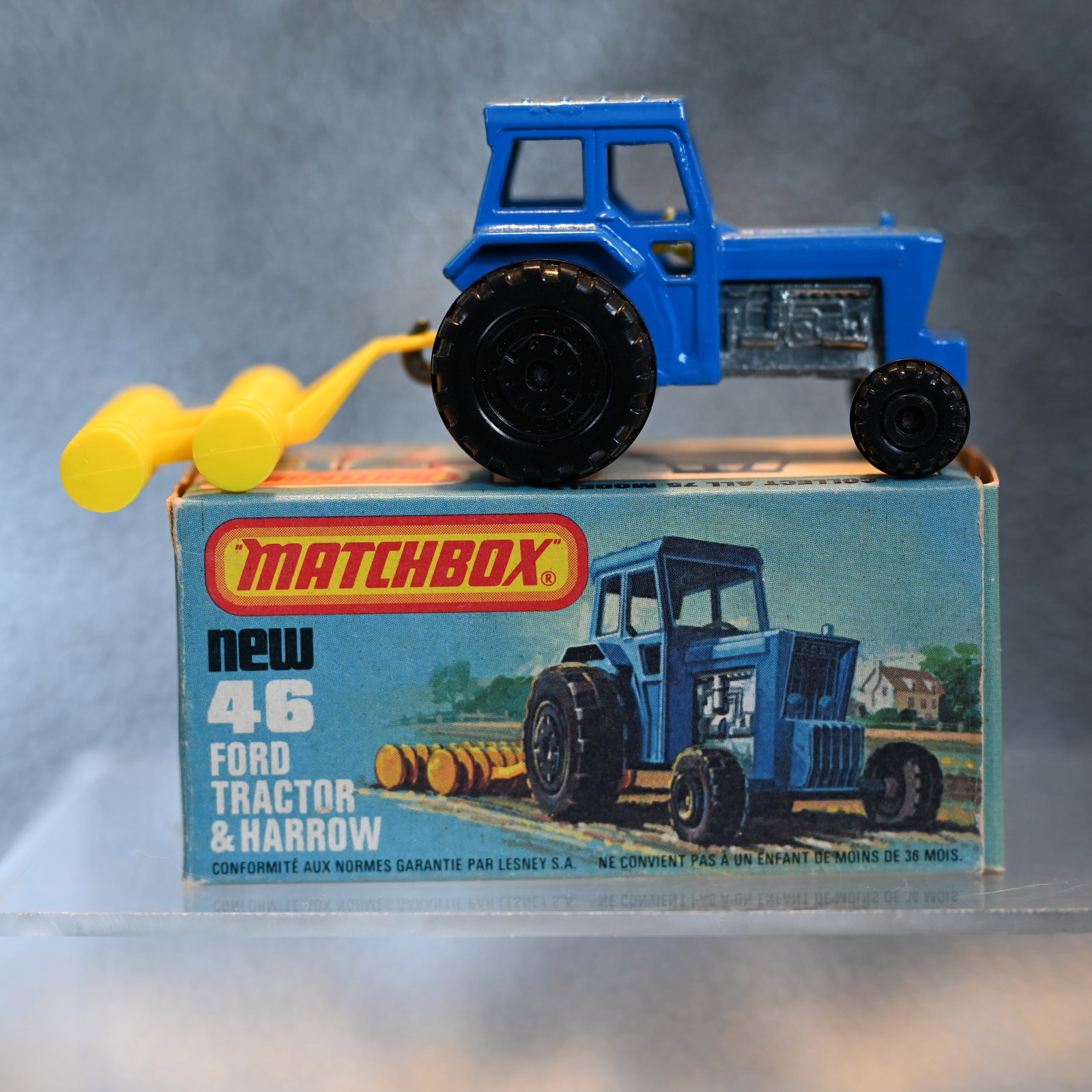 Matchbox New 46 - Ford Tractor & Harrow - 1978: Marked: Matchbox Ford Tractor - Made in England - 1978 Lesney Prod & Co Ltd. - No 46 ( on the front axle )