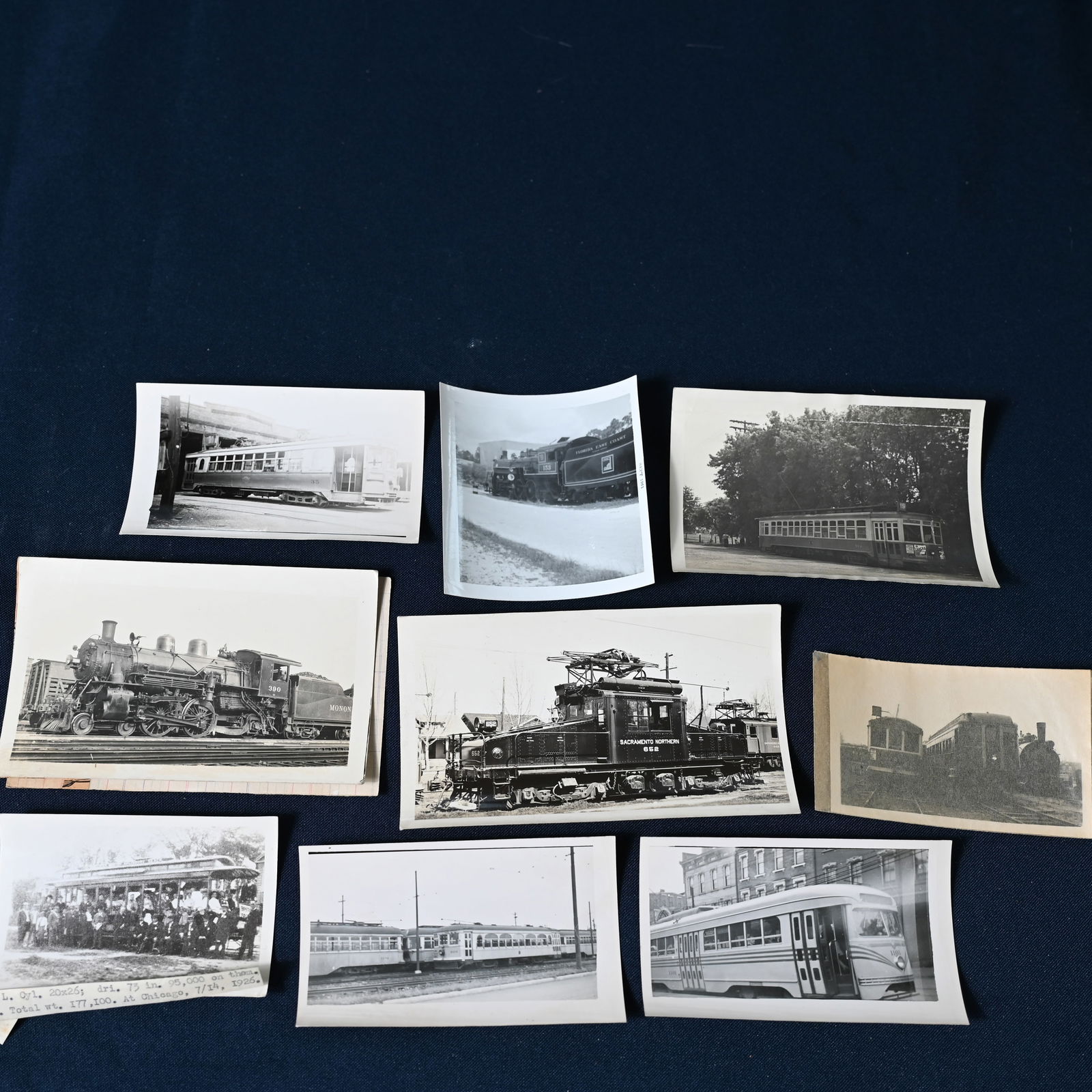 Railroad - Train and Streetcar Photographs & Postcards & Timetable: 11 streetcar and train photos, 19 postcards incl. Burlington Northern Century of Progress - 1933 Chicago World's Fair, a General Motors Train of Tomorrow matchbook, and a Belfast and Moosehead Lake R.