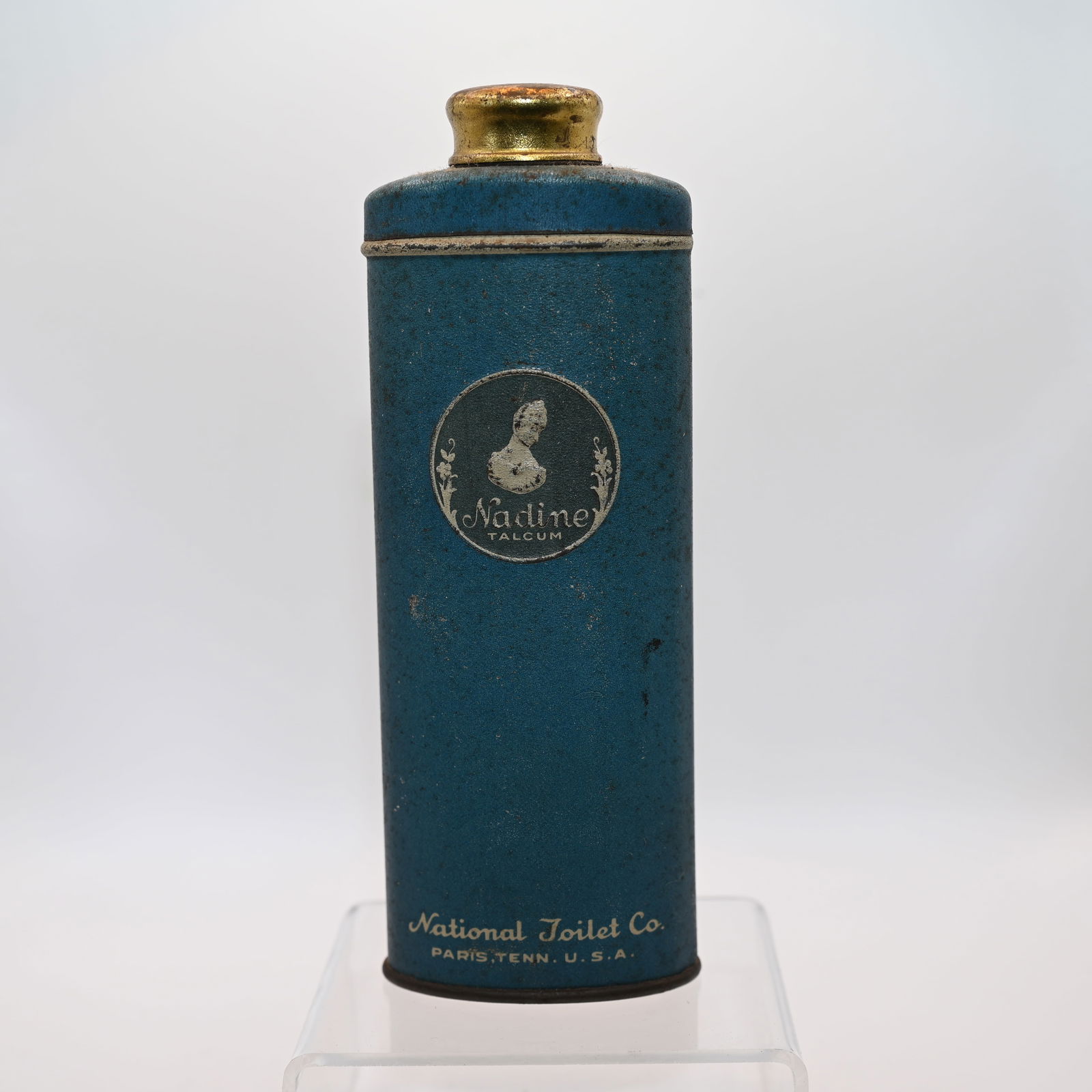 Nadine Talcum: Embossed label. National Toilet Co.