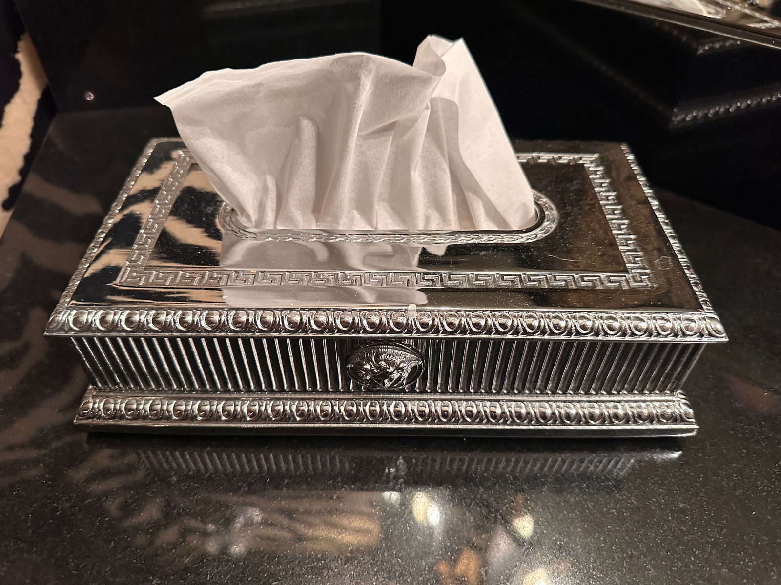 Versace Platinum Napkin Tissue Dispenser that previously sold online for $2,105.00: When conducting research for this piece, we found this item was once offered by Fine et Flair Furniture Inc. Their site still features pictures of this Versace Platinum Napkin Tissue Dispenser. Their