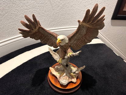 Eagle Sculpture from Edward Marshall Boehm Studio: American Bald Eagle Porcelain Sculpture from Edward Marshall Boehm Studio numbered 189 and signed by Mrs. Helen F. Boehm. These sculptures were expensive when they were new. To put this into perspecti