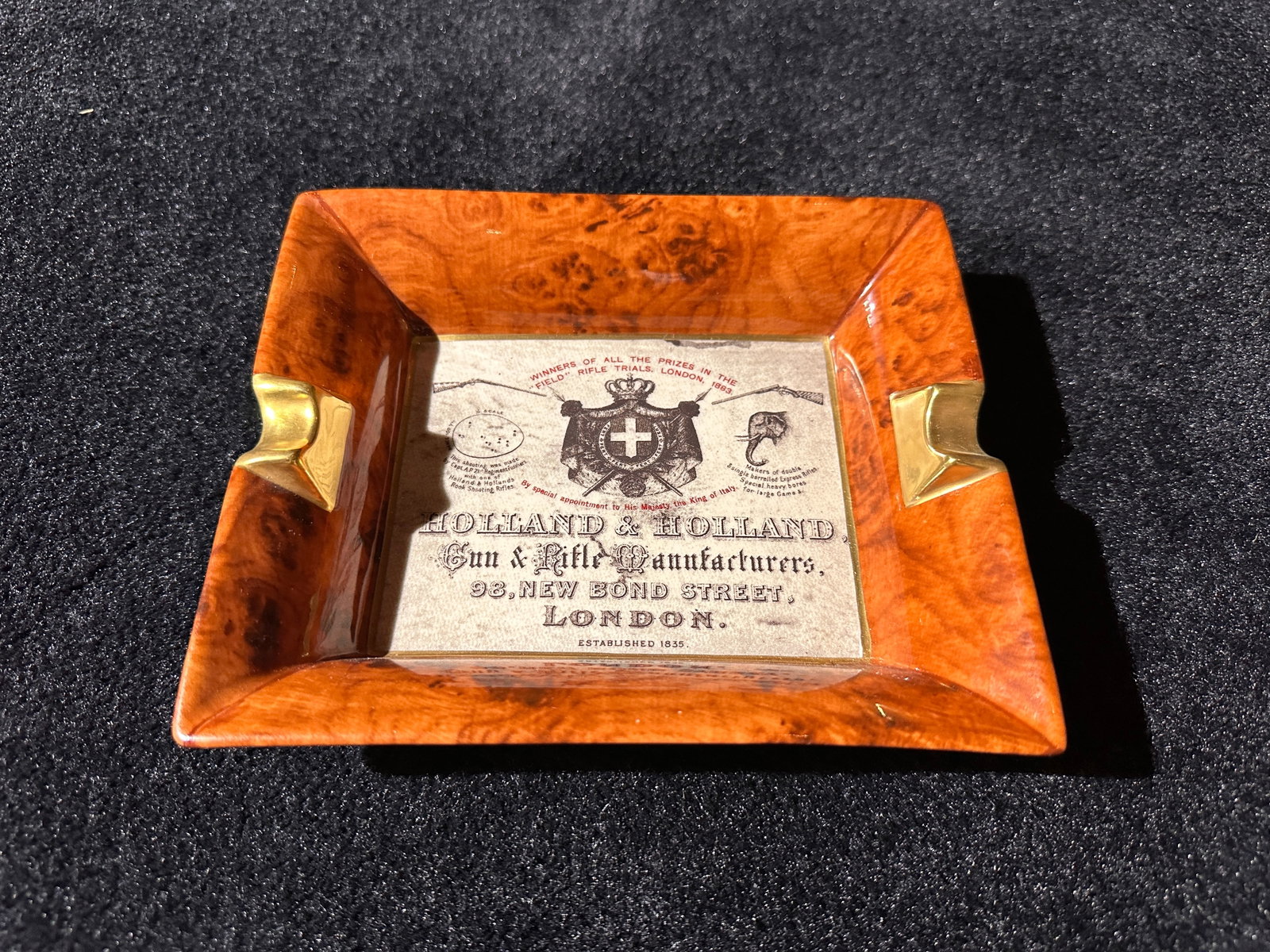 Holland & Holland Ashtray: Holland & Holland Gun and Rifle Manufacturers Ashtray from London England made out of porcelain. Imagine this ashtray in your gun room next to your HOLLAND & HOLLAND ROYAL .375 FLANGED MAGNUM DOUBLE R