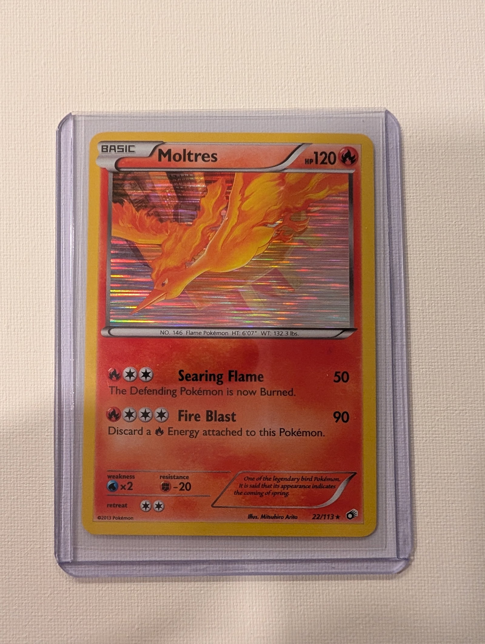 2013 Pokemon Moltres 22 113 Legendary Treasures Holo Rare?: This lot is a Moltres Holo Rare card numbered 22 113 from the 2013 Legendary Treasures set. The card is a Fire type Basic Pokemon with 120 HP and features artwork by Mitsuhiro Arita. It includes the