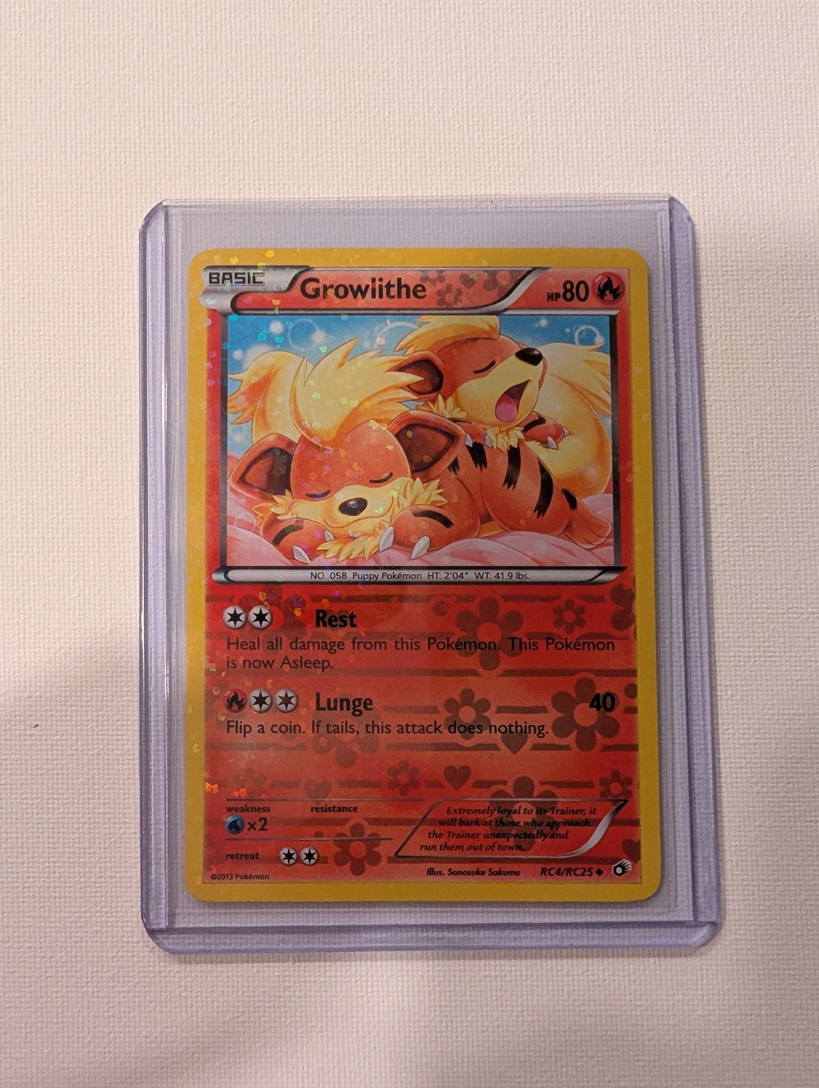 2013 Pokemon Growlithe RC4 RC25 Legendary Treasures Radiant Collection Holo.: This lot is a Growlithe Holo card numbered RC4 RC25 from the 2013 Legendary Treasures Radiant Collection. It is a Fire type Basic Pokemon with 80 HP and features artwork by Sanosuke Sakuma. The card i