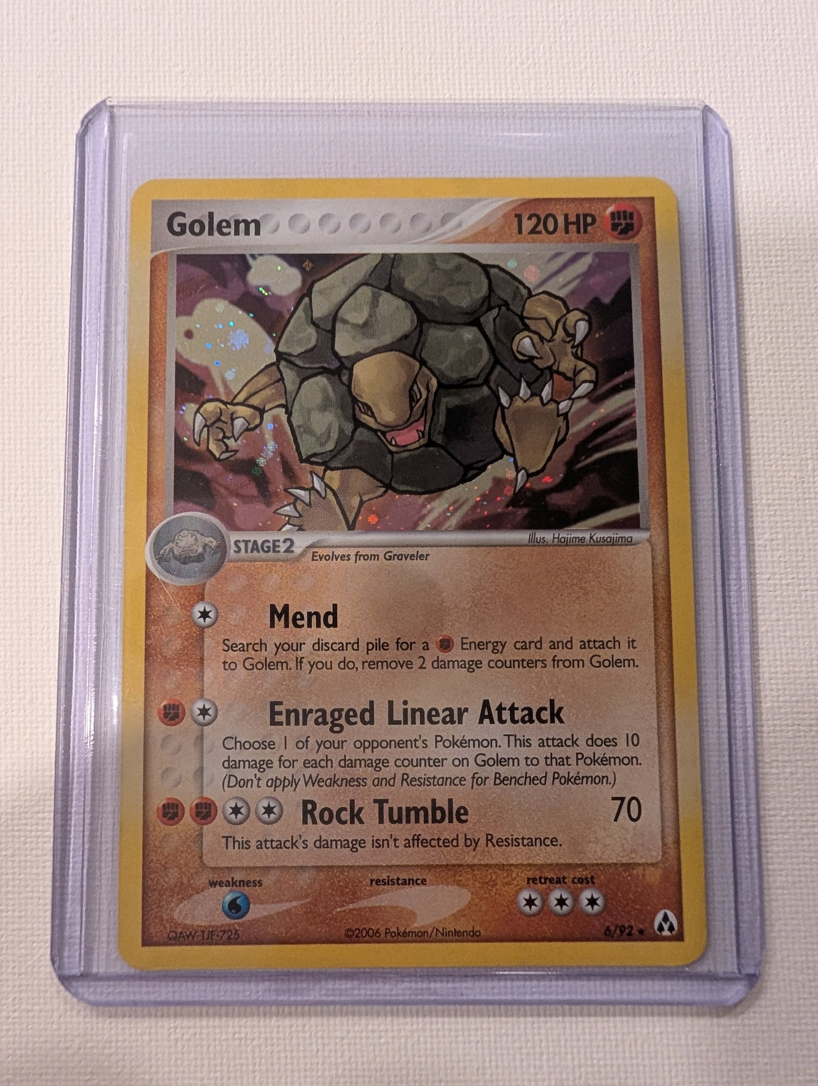 2006 Pokemon Golem 6 92 Ex Crystal Guardians Holo Rare.: This lot is a Golem Holo Rare card numbered 6 92 from the 2006 Ex Crystal Guardians expansion. It is a Fighting type Stage 2 Pokemon with 120 HP that evolves from Graveler and features artwork by