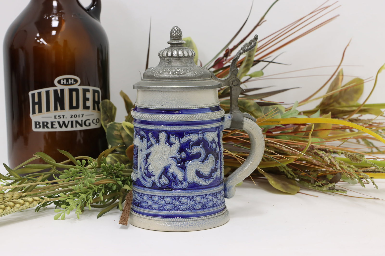 German Antique Farmhouse Stoneware Beer Stein or Mug #45874: A farmhouse beer stein or mug has figures, dragons, and a traditional German saying. German antique stein. Stoneware with a pewter lid & hinge. In very fine condition with minor wear. 1/2 liter. Size